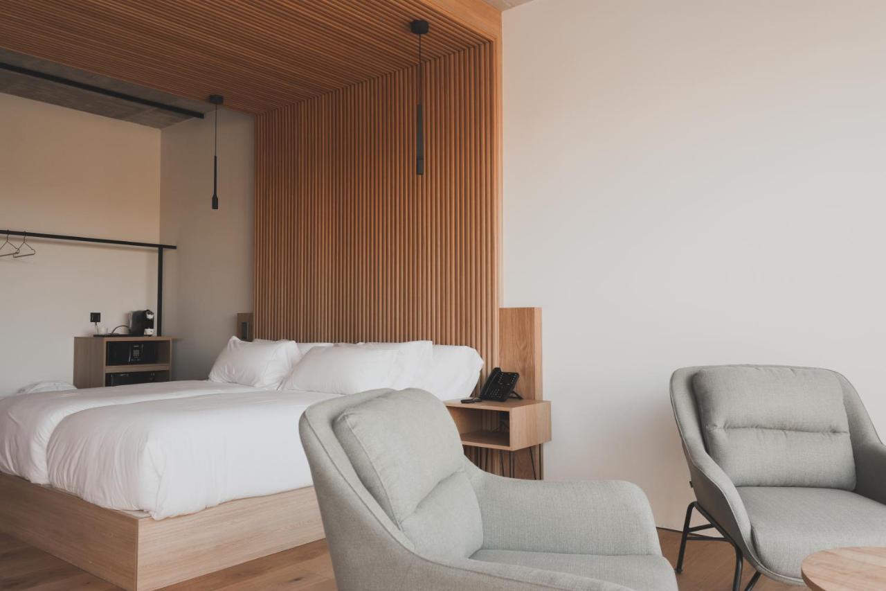 Atmos Hotel Boutique Outes Extérieur photo